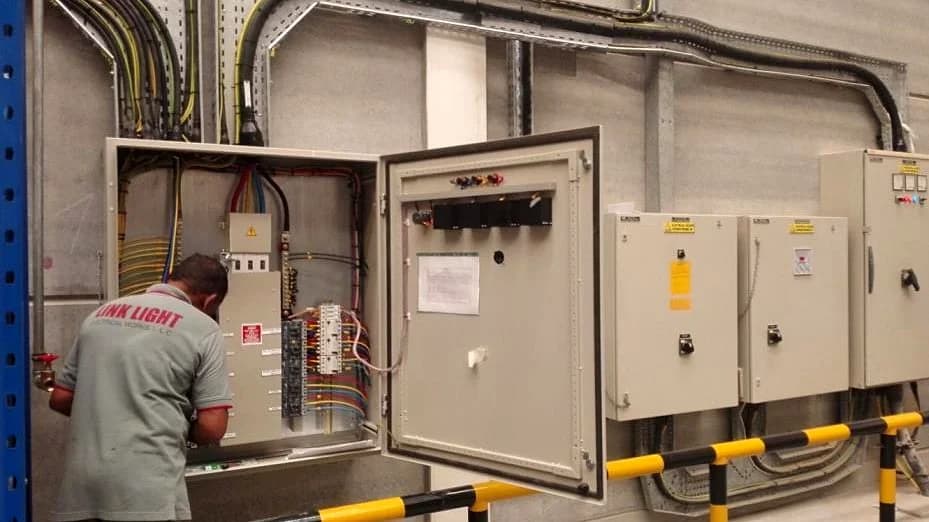 Industrial distribution board installation and precision cabling.