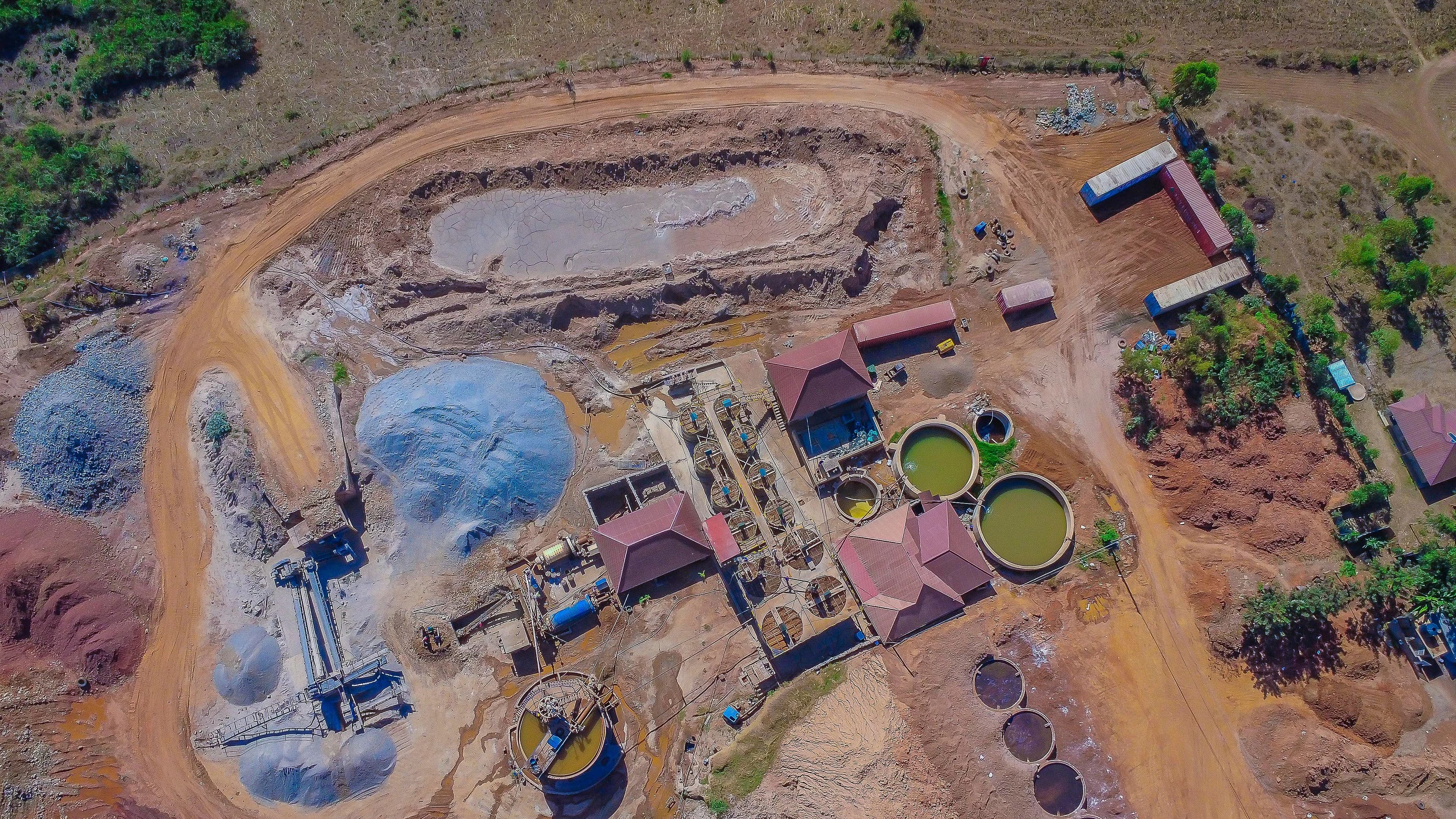 Active gold vein mining site with engineers and crushing hopper in Oyugis, Homa Bay