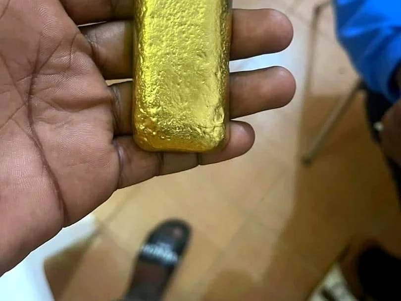 Poured gold doré bar smelted on site from Bondo processing plant output.