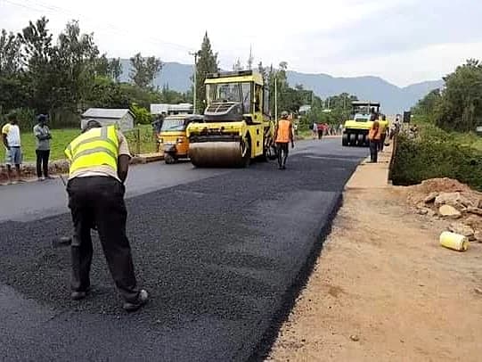Asphaltic concrete placement and surface dressing operations.